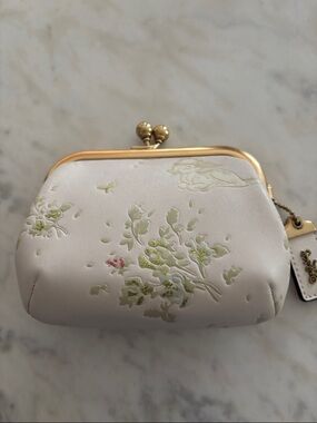 Disney X Coach Kisslock Frame Pouch
With Disney Bambi Motif